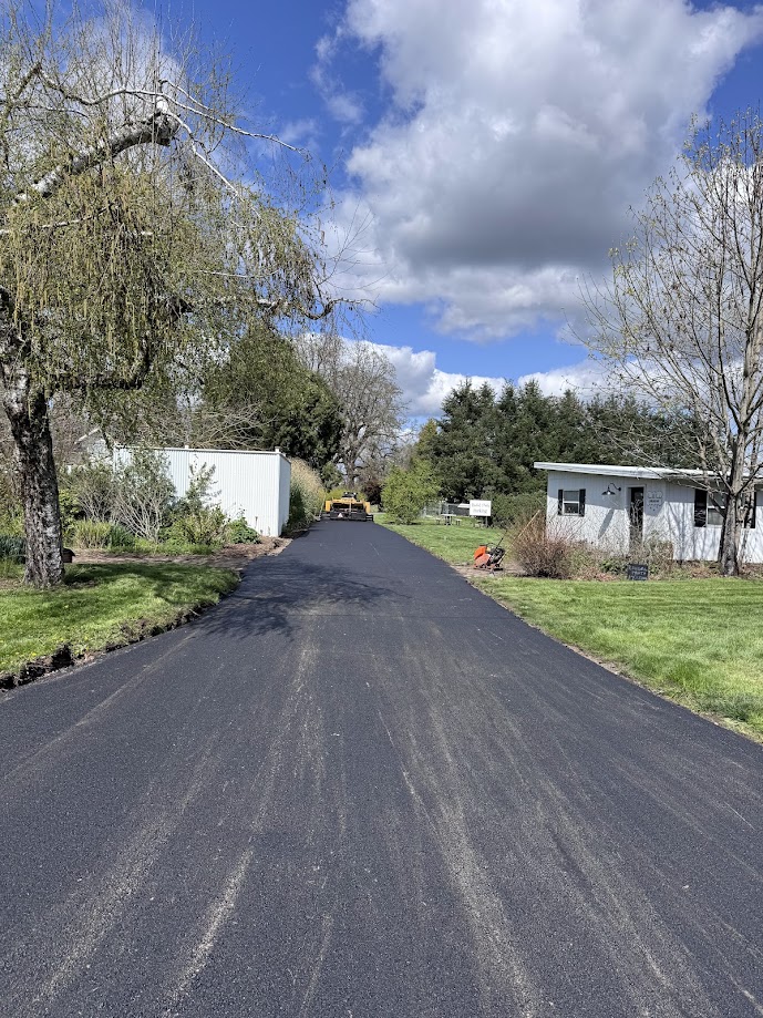 Snapped a picture while the asphalt was still hot. This asphalt paving project was done at in Independence, Oregon at the Green Villa Events